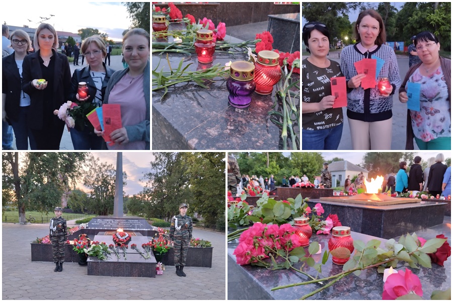 Жители села пришли на акцию со  свечами и цветами.